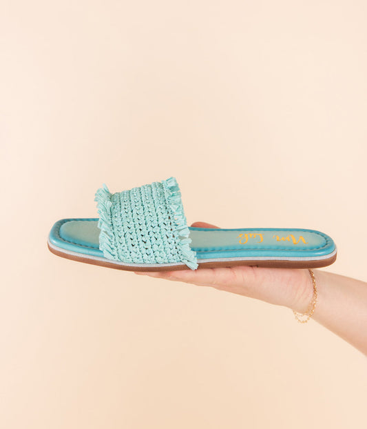 Woven upper sandal in Aqua by Naughty Monkey

Leather footbed with a glitter border